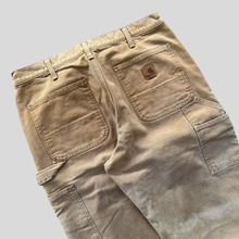 Load image into Gallery viewer, 00s Carhartt Carpenter padded pants - 32/34
